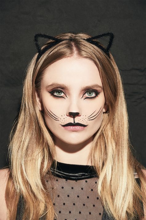 Recreate a cat look this Halloween. Find the accessories and beauty finds you need to complete the look.  #Halloween Cat Makeup Tutorial Halloween, Women’s Cat Costume Diy, Diy Adult Cat Costume For Women, Diy Cat Face Makeup Easy, Last Minute Cat Costume, Cat Costume Diy Women's, Cat Makeup Costume, Adult Cat Costume For Women Diy, Calico Cat Makeup