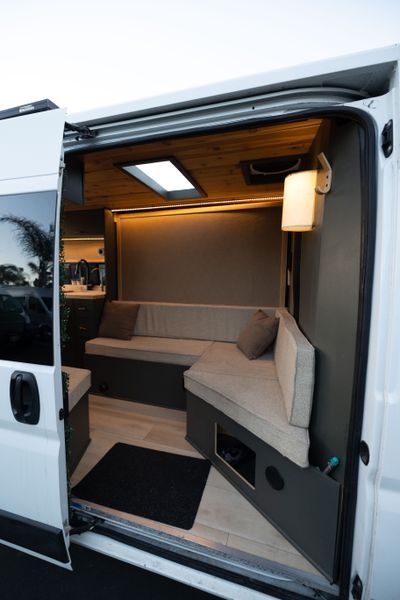 Camper Van For Sale: "Jazz" 2019 ProMaster Luxury Lounge on Wheels Projector In Van, Camper Vans Interiors, Pro Master Van Conversion, Sprinter Van Interior Ideas, Camper Van Interior Ideas, Van Renovation, Sleeper Van, Van Interior Ideas, Office Van