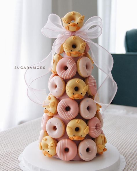 SugarAmors | Quackkk 🐤Duckling Donut Tower | Instagram Donut Tower Cake Birthday, Choux Tower, Donat Tower, Donut Dessert Table, Dessert Tower, Poppy Birthday, Donut Tower, Doughnut Holes, Cake Inspo