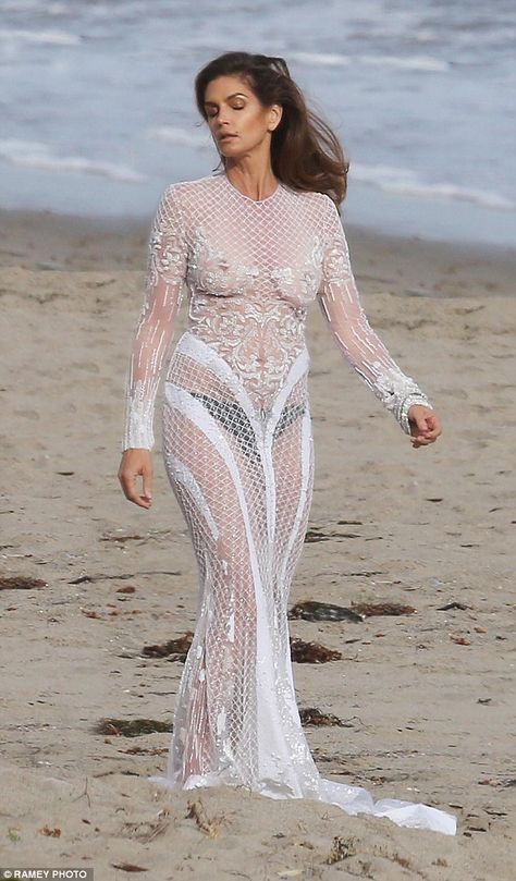 Cindy Crawford goes braless in white mesh dress during sexy shoot | Daily Mail Online White Mesh Dress, Sheer Mesh Dress, Transparent Dress, Cindy Crawford, Sheer Dress, Mesh Dress, Lace Dress, Formal Dresses Long, The Beach