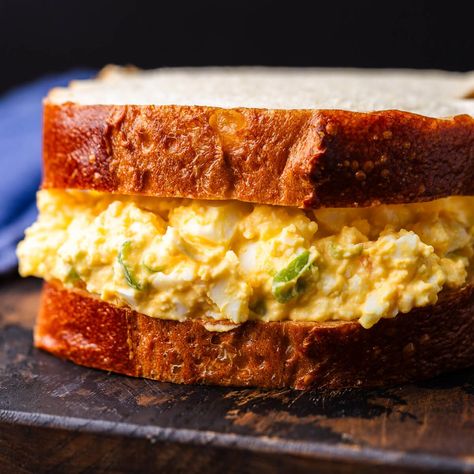 Creamy, tangy, and delicious, this egg salad tastes like it came straight from a New York deli! It's easy to make, loaded with flavor, and perfect scooped on salads, or on toasted bread for a truly unforgettable sandwich! #eggsalad #eggmayonnaise #eggs Sandwich Ideas For Lunch, Simple Egg Salad, Classic Egg Salad Sandwich, Ideas For Lunch, Egg Sandwich Recipe, Egg Salad Sandwich Recipe, Classic Egg Salad, Egg Salad Sandwich, Deli Sandwiches