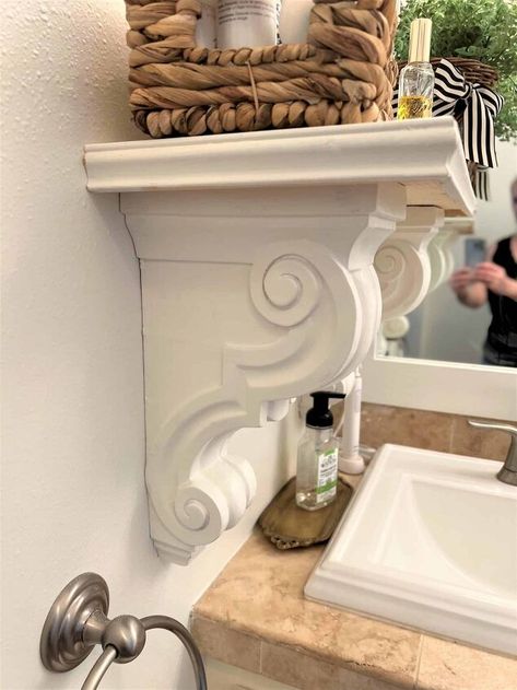 By Renae FreyThis shelf is simple, easy to build and affordable. All it takes are some wood, some corbels and you Floating Shelf With Corbels, Shelf With Corbel, Corbel Shelf Ideas, Decorating With Corbels, Hallway Shelf Ideas, Over The Toilet Shelf Decor, Shelves With Corbels, Corbels Ideas, Corbel Brackets