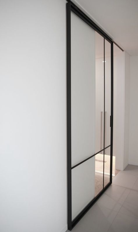 Trackless sliding glass door - Media Room Trackless Sliding Doors, Sliding Doors Black Frame, Black Metal Sliding Glass Door, Modern Classic Door, Slim Frame Sliding Doors, Black Metal And Glass Barn Door, Living Room Sliding Doors, Steel Glass Barn Door, Secret Walls