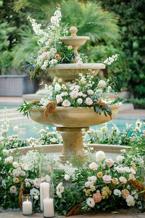 Fountain Decoration Ideas Wedding, Golden Wedding Flowers, Fountain With Flowers Wedding, Flower Filled Wedding, French Backyard Wedding, Old South Wedding Theme, Garden Themed Wedding Decor, Elegant Garden Wedding Reception, Courtyard Wedding Decorations