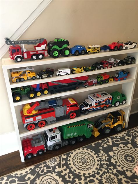 Truck storage Toy Storage Ideas, Boy Toddler Bedroom, Basement Playroom, Boys Playroom, Toddler Boys Room, Playroom Design, Playroom Organization, Toddler Rooms, Kids Room Organization