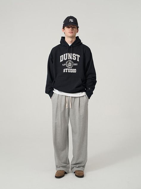 It is a straight fit wide jogger pant with leather D logo embellishment. The sweatpant features relaxed fit silhouette and pleats on the front to make stylish look. The pant can be styled in two ways using the drawstring on the hem. It has leather logo embelishment and embroidery point on the front pocket. The pant is easy to style with different items, especially sweatshirts and hoodies from the brand. - Elastic band waist- Side pockets- Back pockets- Logo label Man Sweatpants Outfit, Men’s Outfits Sweatpants, Men’s Sweats Outfit, Sweatpants Fit Men, Guys Joggers Outfits, Male Sweatpants Outfit, Sweet Pants Outfits Men, Men’s Sweatpants Fashion, Gray Joggers Outfit Men