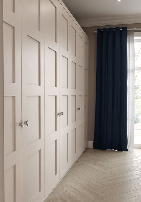 A wall of fitted shaker-style wardrobes in a soft white paint finish with silver metallic handles - a bespoke design handcrafted by Neville Johnson Bedroom Built In Cabinet Ideas, Shaker Style Bedroom, Fitted Wardrobe Ideas, Neville Johnson, Fitted Wardrobes Bedroom, Bedroom Built In Wardrobe, Bedroom Cupboards, Wardrobe Door Designs, Built In Cupboards