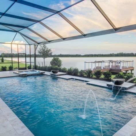 With this pool in your backyard you'll have weekend vibes all the time. Find out more about the home that goes with the pool on NewHomeSource today. Screen In Pool Ideas, Hummingbird Backyard, Florida Lanai, Dream Backyards, Pool Screen Enclosure, Pool Makeover, Screened Pool, Beach Entry Pool, Florida Pool