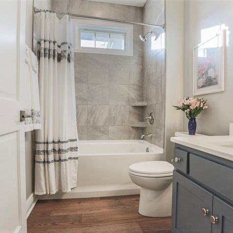 Wood Floor Bathroom Ideas Modern, Grey Bathroom Cabinets With Wood Floors, Small Bathroom Wood Tile Floor, Grey Bathroom With Wood Floor, Small Bathroom Remodel Dark Floor, Small Bathroom With Hardwood Floors, Bathroom Flooring Color Ideas, Small Bathroom Brown Floor, Dark Wood Floors In Bathroom