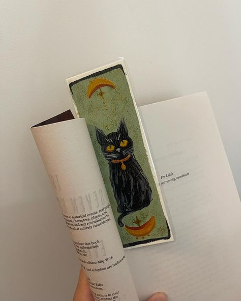 witchy cat vibes ✨🐈‍⬛ slide for prices hand painted bookmark 2x6 laminated for protection dm to order your own customized bookmark 🤍 Black Cat Bookmark, Bookmarks Painting, Bookmark Painting, Painting Bookmarks, Homemade Bookmarks, Witchy Cat, Cat Bookmark, Bookmark Ideas, Custom Bookmarks