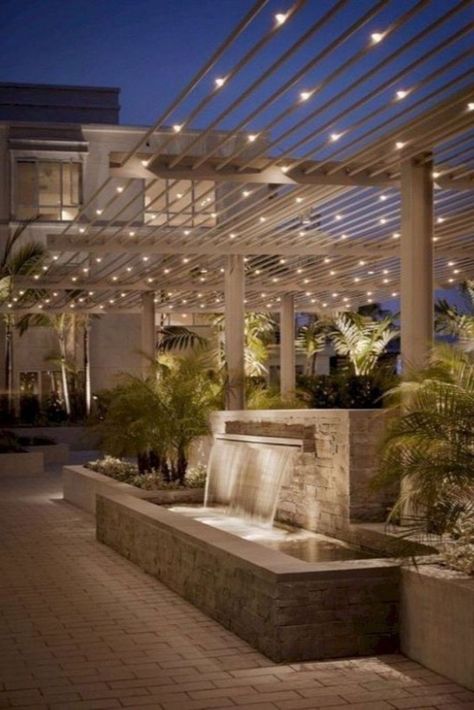 Transform your garden into a haven of radiance with our stunning outdoor lighting solutions. Immerse yourself in the beauty of light and luxury! #luxxu #luxxulighting #interiordesign #lifestylebyluxxu #outdoorlighting #luxuryoutdoors #outdoor #garden Landscape Lighting Design, Small Patio Garden, Pergola Lighting, Backyard Lighting, Modern Backyard, Small Backyard Patio, Festoon Lighting, Patio Lighting, Small Patio