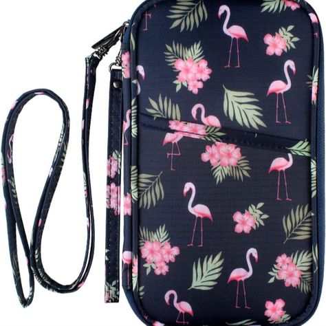 I love flamingos! This Travel Passport Wallet Holder is a must have. Keep your passports, credit cards, money and more safe inthe RFID holder. #Affiliate Flamingo Purse, Family Passport Holder, Travel Document Organizer, Document Organizer, Documents Organization, Card Organizer, Passport Wallet, Travel Wallets, Credit Card Holder