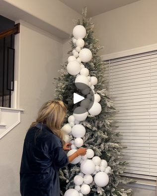 6M views · 65K reactions | Unique way of decorating a Christmas tree | A new way to decorate your tree this year! 🎄 | By LADbible | Facebook Christmas Tree With Big Balls, Christmas Ball Garland For Tree, Christmas Trees With Large Ornaments, Cascade Ornaments On Tree, Snowball Christmas Tree, How To Put Christmas Balls On Tree, How To Decorate My Christmas Tree, Christmas Ball Garland Decorating Ideas, Christmas Bulb Clusters On Tree