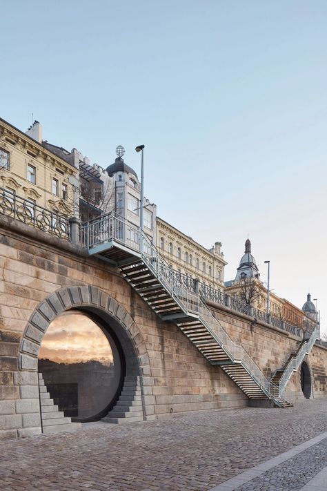 New cafes, galleries, and studios are popping up along the Vltava River in Prague, although they’re not immediately visible from atop the embankment. Tucked inside former storage units embedded within the structure itself are several tunnel-like spaces redesigned for public use. Vaulting, Oslo, Prague Architecture, Cafe House, Prague Czech, Travel Europe, Tower Bridge, Public Space, Set Design