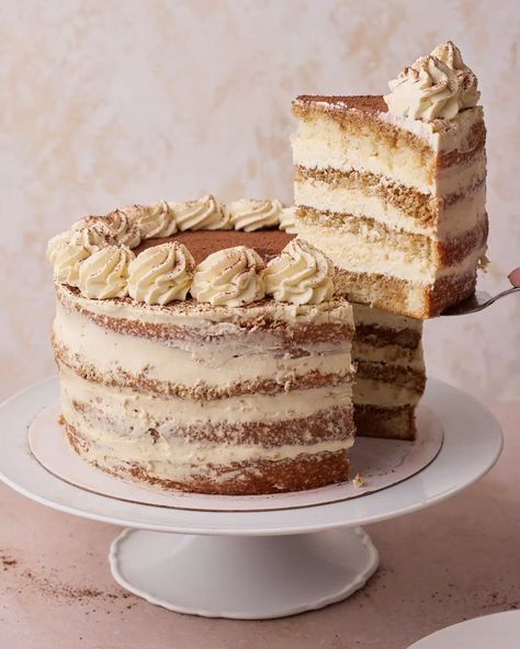 This Tiramisu Cake recipe is for a delicious tiramisu layer cake, which takes all the flavors of traditional tiramisu and makes a perfect celebration cake or birthday cake for coffee lovers. Layers of genoise sponge cake soaked in espresso and amaretto and stacked with mascarpone cream and a dusting of cocoa powder. It tastes just like authentic tiramisu but is beautiful to slice into and serve at parties or dinner parties. A really impressive dessert recipe and showstopper! Tiramisu Design Ideas, How To Make Tiramisu Cake, Non Traditional Birthday Cake Ideas, Tiramisu Roll Cake, Tiramisu Layer Cake, Birthday Cake Flavor Ideas, Birthday Tiramisu, Recipes Using Whipping Cream, Authentic Tiramisu Recipe