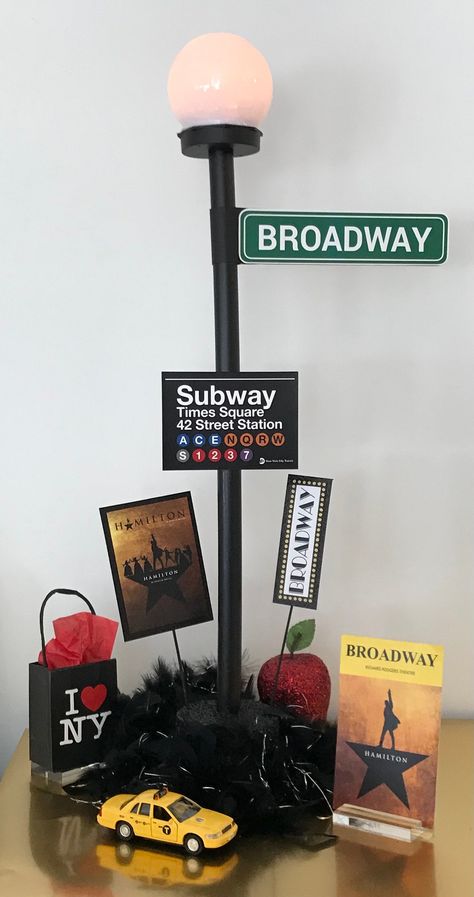 "These centerpieces will make your New York themed event come alive! Use NYC street names rather than table numbers to make your event truly unique! 28\" Tall Lamp Post actually Lights Up! Lamp Post with Street Sign available alone OR with sign picks OR with 3D accessories: Lamp Post with 3\" Bulb and 8.25\" NYC Street Sign: BROADWAY, Times Square, Fifth Ave, Madison Ave, 34th Street, 42nd Street, etc... Choose from: 1. Lamp Post Street Sign ONLY OR 2. Lamp Post Street Sign with six (6) correspo New York Theme Party, Broadway Theme, Broadway Party, New York Party, New York Theme, Tall Lamp, Prom Theme, Nyc Street, I Love Ny