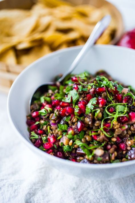 A take on "Texas Caviar", this Lentil Dip dip called Palouse Caviar is made w/ Northwest Palouse grown lentils, pomegranate, avocado, lime & served with corn chips for a festive healthy, vegan GF appetizer. | www.feastingathome.com Lentil Dip, Feasting At Home, Dip Dip, Texas Caviar, Gluten Free Lasagna, Festive Appetizers, Pomegranate Salad, Lentil Salad, Lentil Recipes