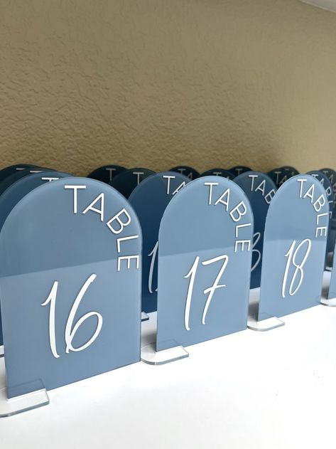 #ArchTableNumbers #WeddingDecor #WeddingTableNumbers #Acrylictablenumbers Cape Cod Table Numbers, Navy Table Numbers, Acrylic Arch Table Numbers Wedding, Diy Dusty Blue Wedding Decor, Dusty Blue Table Numbers, Blue Wedding Table Numbers, Wedding Signage Table, Arched Table Numbers, Baby Blue Wedding Theme