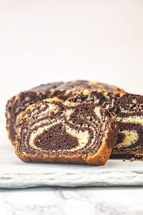 This eggless marble cake is the BEST! It’s moist, light and fluffy with swirls of vanilla and chocolate cake batter. This marble loaf cake is Starbucks inspired but this cake is made without eggs. Eggless Marble Cake, Eggless Baking Recipes, Vanilla And Chocolate Cake, Chocolate Cake Batter, Marble Cake Recipe, Egg Free Desserts, Marble Cake Recipes, Eggless Recipes, Eggless Baking