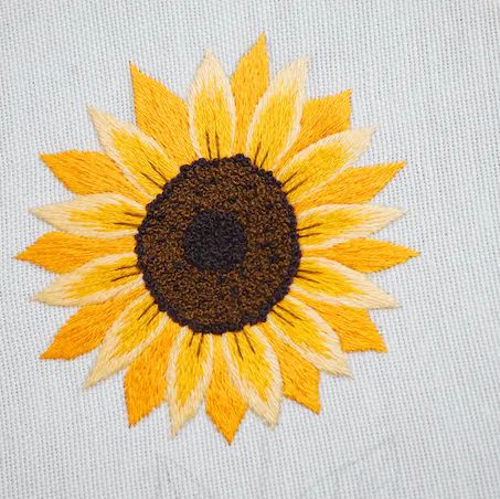 Free Sunflower Embroidery Tutorial | LoveCrafts Sunflower Embroidery Pattern Free, Sunflower Embroidery Tutorial, Embroidery Sunflower, Embroidery Jeans Diy, Sunflower Embroidery, Embroidery Tutorial, Clothes Diy, Embroidery Patterns Free, Embroidery Tutorials