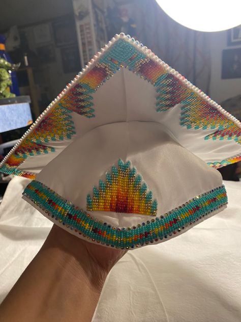 By Faith Bremner Graduation Cap Beaded, Native American Graduation Cap, Beaded Grad Caps, Anishinaabe Beadwork, Beaded Caps Graduation, Beaded Graduation Cap Native American, Native Graduation, Beaded Graduation Cap, Graduation Shawl