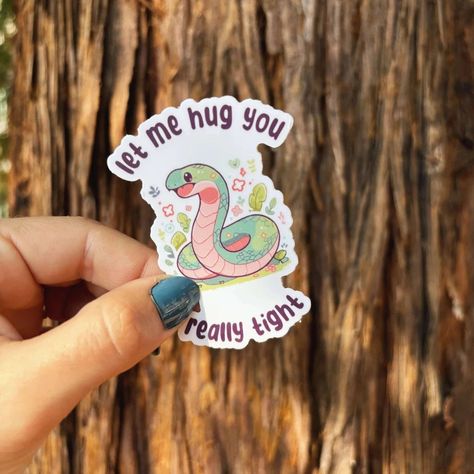 Swamped in the never-ending grind? This sticker's a nudge to hit pause and hug it out--because nothing says 'I survived another meeting' like a sticker squeeze. Slap it on and feel the love, one snake-y embrace at a time. 🌟 Includes one (1) premium vinyl sticker. 🌟 Waterproof, weatherproof, and scratch resistant. 🌟 Each sticker is securely packaged in a protective sleeve for safety when it's shipped to you. ✨ Thick Premium Vinyl Finn's stickers are printed on premium vinyl with a permanent ad I Hug You, Little Doodles, Animal Sketches, New Sticker, Hug You, Sticker Collection, Free Stickers, Cute Doodles, Waterproof Vinyl