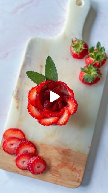 Emily Love Leserman on Instagram: "🍓HOW TO MAKE: strawberry roses 🍓⁣ ⁣ it’s met gala Monday, and I wanted to make a sleeping beauty rose to celebrate the biggest night: “the garden of time” ⁣ I first saw these gorgeous strawberry roses on @wildsaltstudio page and they took my breath away, and I had to do it myself!  I imagine these on a fruit board, grazing table, or even frozen in a margarita!" How To Make Strawberry Roses, Rose Strawberry, Rose Strawberries, Rose Themed Food, Strawberry Rose, Rose Charcuterie Board, Diy Strawberry Decorations, Strawberry Roses, Strawberry Flower