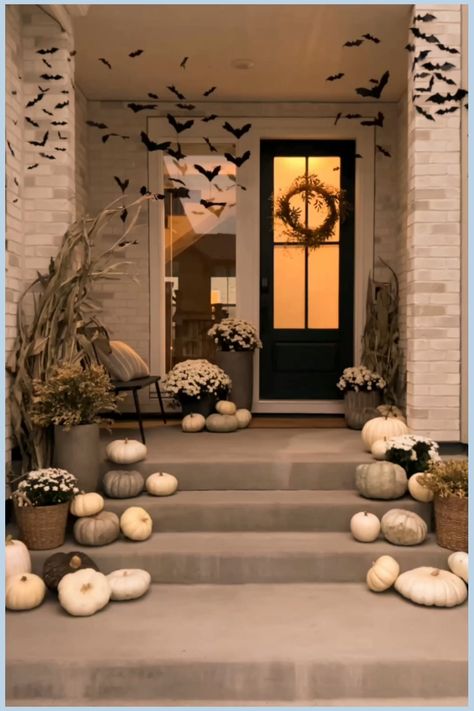 outdoor halloween decorations Halloween Fall Decor Outdoor, Hanging Bats For Halloween Porch, Bats Outdoor Decor, Front Porch Bats Halloween, How To Arrange Bats On Wall, Hanging Bats Front Porch, Black And White Halloween Decor Porch, White Pumpkin Decor Front Porches, Modern Outdoor Halloween Decor