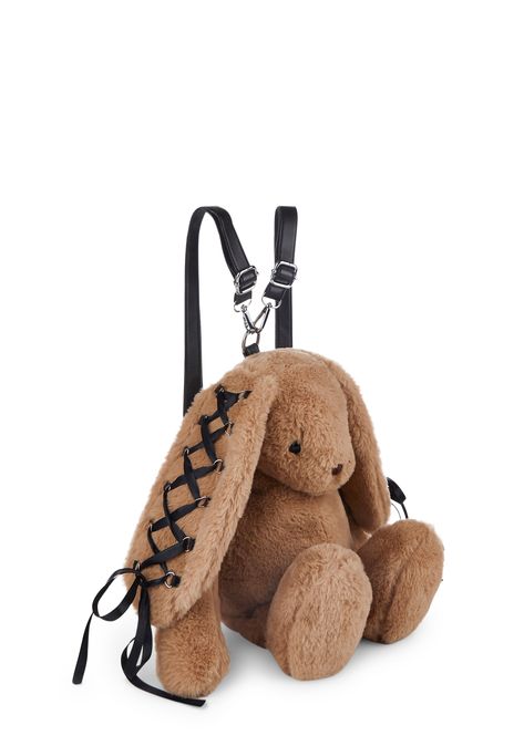 cuz ready for an adventure? This bunny plush backpack has a faux fur construction, a lace up ribbon design on the bunny ears, D-ring hardware, ear zip pockets, a back zippered pocket, embroidered detailing, and adjustable detachable vegan leather str Cool Mini Backpack, Bug Backpack, Stuffed Animal Purse, Rave Backpack, Cute Stuffies, Novelty Backpack, Stuffed Animal Bag, Teddy Bear Purse, Stuffed Animal Backpack