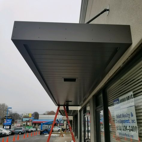 MASA Extrudeck canopy with lights at Grant Plaza in Philadelphia, PA. #architecture #design #metal #manufacturing #Americanmade Black Metal Awnings On House, Canopy Design Outdoor House, Canopy Design Entrance, Entrance Canopy Design, Canopy With Lights, Aluminum Awning, Metal Awnings, Building Canopy, Contemporary Exterior Doors