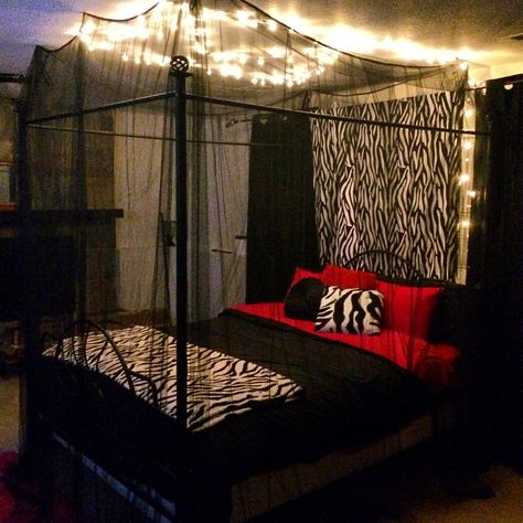 Canopy bed with hanging warm white lights. Black, white, hot pink with zebra accents..  I love my room! Canopy Bed Y2k, Y2k Canopy Bed, Curtains Around Bed, Zebra Print Decor, Y2k Room, Gothic Bedroom, Warm White Lights, Hippy Room, Goth Accessories