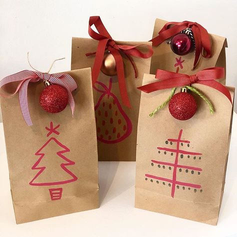 Hand painted Brown Paper Bags, beautiful grosgrain ribbon and baubles and a whole lot of love is what you can expect this Christmas at… Brown Bag Christmas Wrapping, Decorate Lunch Bags Brown Paper, Paper Bag Ornaments Diy, Painted Paper Bags, Paper Bag Decorating Ideas Christmas, Brown Gift Bag Decorating Ideas, Brown Paper Bag Christmas Crafts, Christmas Brown Paper Bags, Brown Paper Bag Christmas