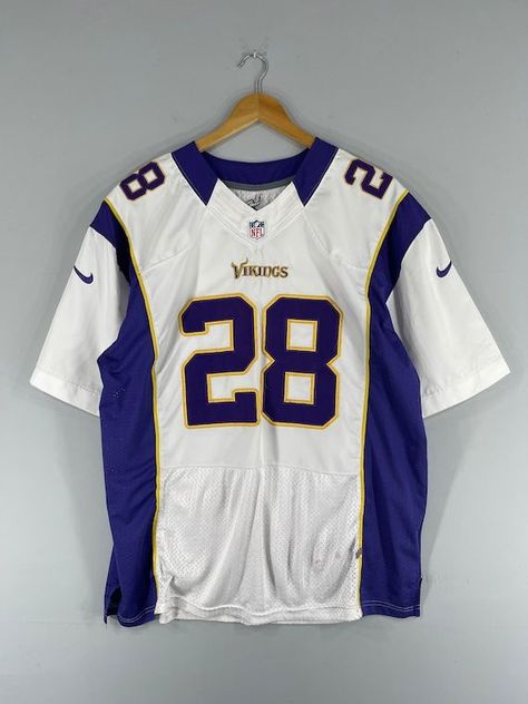 Get your hands on this vintage Minnesota Vikings NFL fan apparel featuring an Adrian Peterson jersey. Show your support for the American football team... Rugby T Shirts Design, Cool Jersey Design Football, Vintage Nfl Shirts, American Football Jersey Design, Vintage Football Jersey Outfit, Nfl Jersey Outfit, Football Jersey Design, American Football Shirt, Adrian Peterson