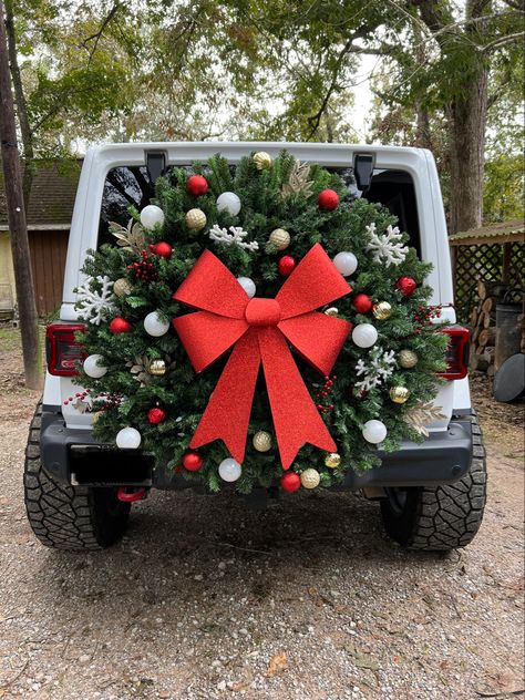 All hand mand, products from hobby lobby! Wrangler Christmas Decorations, Jeep Tire Decorations, Jeep Christmas Wreath, Holiday Jeep Decorations, Jeep Christmas Decorations Parade, Jeep Decorated For Christmas, Jeep Tire Christmas Decorations, Jeep Wrangler Christmas Wreath, Jeep Tire Halloween Decorations