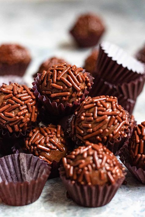 This Brigadeiro Recipe shows you how to make the chocolate fudge balls that are a sentimental and history-filled dessert in Brazil. They are made with sweetened condensed milk and are normally topped with sprinkles! Brazilian Kitchen, Fudge Balls, Chocolate Milk Powder, Brigadeiro Recipe, Xmas 2024, Baking Cocoa, Candy Crafts, Pumpkin Chocolate, Recipe Details