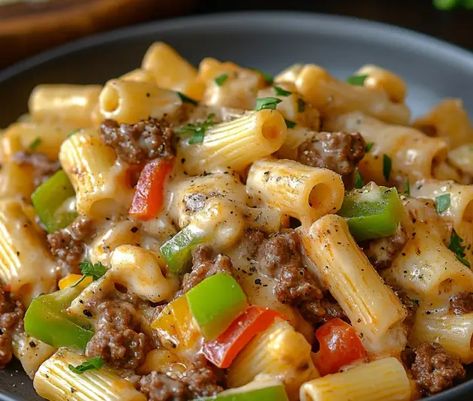 If you’re a fan of the classic Philly cheesesteak and love hearty pasta dishes, Philly Cheesesteak Pasta is the perfect fusion for your next meal. This dish takes the ... Read more Philly Cheesesteak Pasta Ground Beef, Philly Cheesecake Pasta, Crockpot Philly Cheese Steak Pasta, Easy Cooked Meals, Meal Recipes Family, Philly Cheese Steak Pasta Ground Beef, Philly Cheese Steak Salad, Meals Using Ground Beef, Philly Pasta