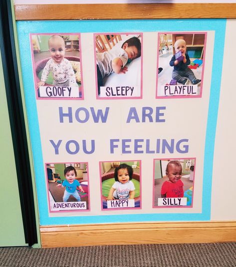 Feelings Wall. Infant classroom. I have feelings unit. Daycare Interactive Wall, Infant Classroom Wall Ideas, Infant Decorations Classroom, Infant Interactive Activities, Baby Room Preschool Ideas, Social Emotional Infant Activities, I Have Feelings Activities For Infants, Infant Classroom Family Wall, Posters For Infant Classroom