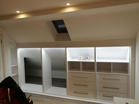 Fitted Wardrobes Loft Bedroom, Dressing Room Eaves, Built In Wardrobe Loft, Loft Fitted Wardrobe Ideas, Walk In Wardrobe Loft Conversion, Closet Under Roof, Loft Walk In Wardrobe, Loft Conversion Eaves Storage, Attic Wardrobe Ideas