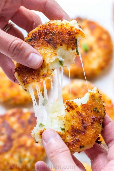 Cheesy Mashed Potato Pancakes Recipe (VIDEO) - NatashasKitchen.com Claim Jumper Potato Cakes, Cheesy Stuffed Potato Cakes, Idaho Sunrise Potato, Cheesy Potato Cakes, Green Chili Potato Cakes, Green Chili Cheese Potato Cakes, Cheesy Beef Stuffed Potato Cakes, Cheese Stuffed Potato Cakes, Idaho Potato Recipes