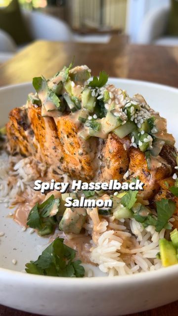 Sarah Thomas on Instagram: "Spicy Hasselback Salmon This Spicy Hasselback Salmon is a fun twist on a sushi roll and it’s perfect any night of the week. 💥 The salmon is air fried to crispy perfection, then topped with a fresh cucumber, jalapeno, avocado salad. Dusted with sesame seeds, fresh cilantro and the BEST spicy creamy sauce. Your entire family will LOVE this recipe. Google Search “Healthyish Spicy Hasselback Style Salmon” or click the link in my bio for the full recipe. You’ll Need Hasselback Salmon, Jalapeno Salmon, Spicy Salmon Recipe, Spicy Hasselback Salmon, Jalepeno Salmon Recipe, Salmon Spicy Mayo, Pescetarian Recipes, Meat Free Monday, Spicy Salmon