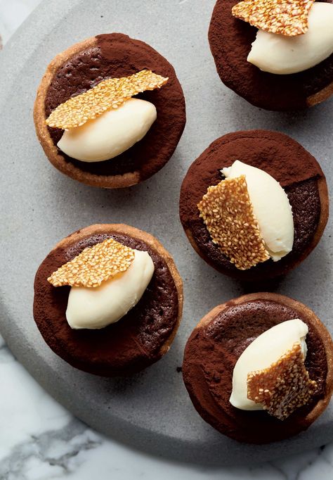 Yotam Ottolenghi’s Little Baked Chocolate Tarts with Tahini and Sesame Brittle (or marmalade) Sesame Brittle Recipe, Sesame Brittle, Chocolate Tarts Mini, Otto Lenghi, Sweet Slices, Yotam Ottolenghi Recipes, Chocolate Tarts, Ottolenghi Recipes, Sweet Recipe