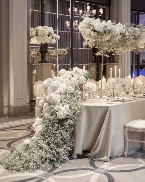 Long Table Candelabra Wedding, Unique White Wedding Florals, Wedding Candles Reception, White Themed Wedding Decor, Fall Wedding White Flowers, Flower Decor For Wedding, Elegant White Wedding Flowers, Babybreath Table Decoration Wedding, Gazebo Flowers Wedding