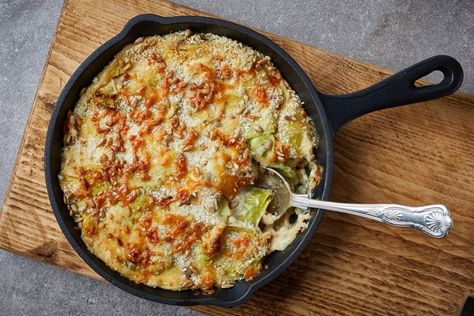 Leek Gratin Recipe - Great British Chefs Christmas Dinner Party Recipes, How To Cook Leeks, Leek Gratin, Leek Recipes, Oven Baked Recipes, Holiday Sides, Great British Chefs, Cheesy Sauce, Dinner Party Recipes