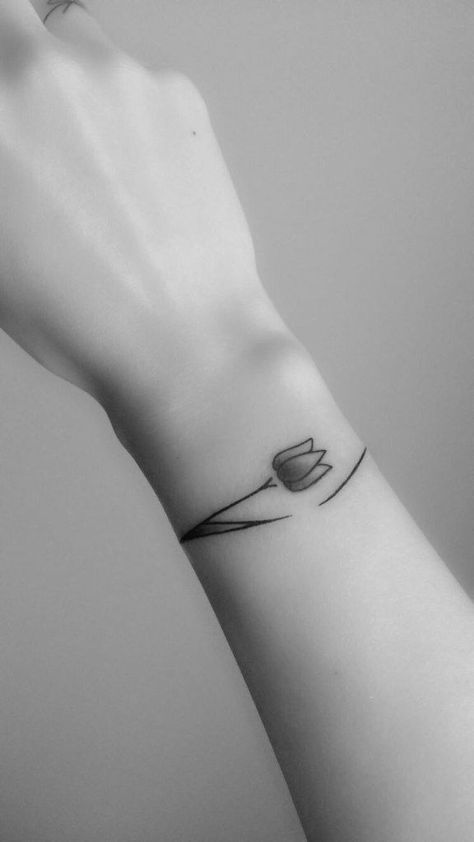 230+ Armband Tattoos for Men and Women (2022) - TattoosBoyGirl Armband Tattoo Frau, Tato Irezumi, Wrist Bracelet Tattoo, Tulip Tattoo, Armband Tattoos, Tattoo Trend, Irezumi Tattoos, Arm Band Tattoo, Sunflower Tattoos