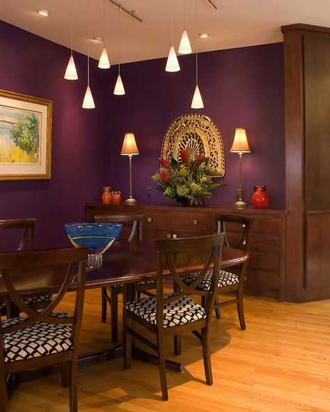 Purple walls, pendant lights, rich brown wood table and cabinet set on a light colored oak floor in a Richmond dining room Hall Colours, Purple Dining, Purple Dining Room, Coffee Interior, Gothic Kitchen, Purple Living Room, Brown Living Room Decor, Living Room Wall Color, Room Wall Colors