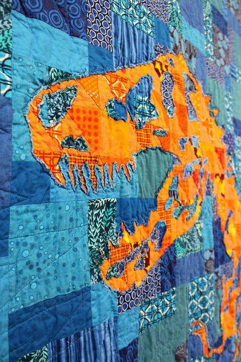 Another Daniel Rouse creation. I love his use of color with this reverse applique. Dino Quilt, Dinosaur Quilt, Childrens Quilts, Reverse Applique, Baby Boy Quilts, Quilt Projects, Animal Quilts, Boy Quilts, House Projects