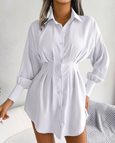 Shirt Dress https://linktr.ee/angelcollections.in Wear a shirt dress to keep things relaxed and cool. It is a loose-fitting dress with a button-down front and a shirt collar. This design is available in various lengths and occasionally has a defined waist. A shirt dress's collar and button-down front serve as its focus points. You can easily dress up or down; just pick up a pair of chunky ankle boots or sneakers, and you'll be prepared for a night on the town or at the beach!... #angelcollec... Pleated Shirt Dress, Asymmetrical Shirt, Outfit Autumn, Outfit Halloween, Dresses Casual Fall, Pleated Shirt, Jumpsuit Outfit, Inspo Outfit, Sleeves Clothing