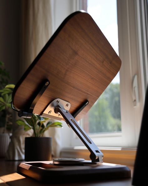 📖📚💻Upgrade your workspace with our 2-in-1 Adjustable Laptop Stand and Book Holder, crafted from luxurious black walnut wood. This premium, durable stand offers 360-degree adjustability for perfect viewing angles, blending functionality with elegance. Perfect for both laptops and books, it transforms your desk into a sophisticated, productive haven. 🎧 #WorkspaceGoals #LaptopStand #HomeOffice #BlackWalnut #DeskAccessories #ProductivityBoost #LuxuryDesign #TechGadgets #BookHolder #ErgonomicDesi... Laptop Stand Aesthetic, Tablet Holder Diy, Genius Inventions, Laptop Stand Wood, Laptop Stand For Desk, Adjustable Laptop Stand, Apple Watch Stand, Home Studio Setup, Laptop Tray