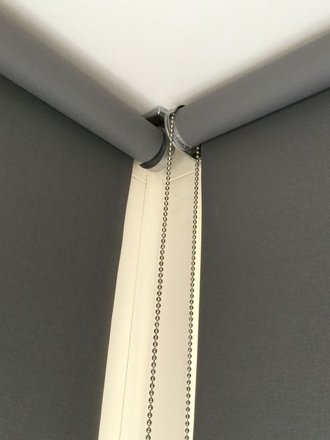 Grey roller blinds get a designer look with these chrome brackets. #designerblinds Cortinas Roller, Grey Roller Blinds, Suite Master, Shutter Blinds, Corner Window, Roller Blind, Window Blinds, Curtains Blinds, Window Trim