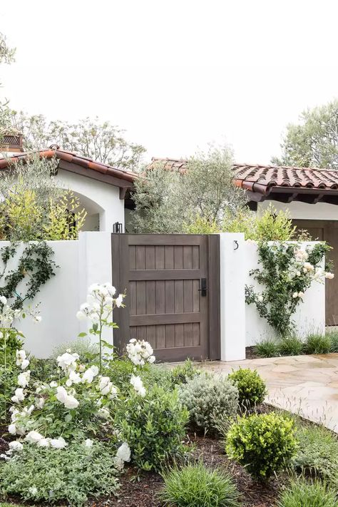 Spanish Landscaping, Spanish Style Home Exterior, Spanish Style Exterior, Modern Spanish Style, Spanish Exterior, Door Painting, Brick Fence, Spanish Modern, Small Attic